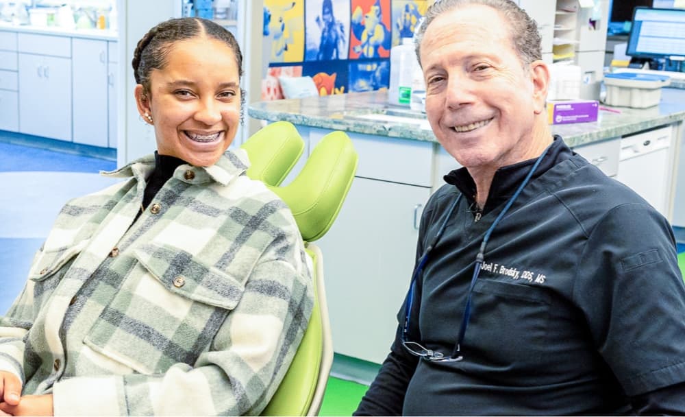 young patient smiling with Dr. Brodsky