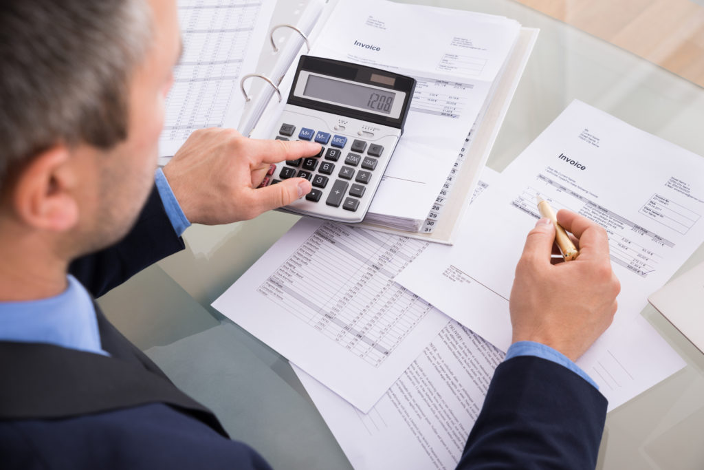 Businessman Doing Calculating